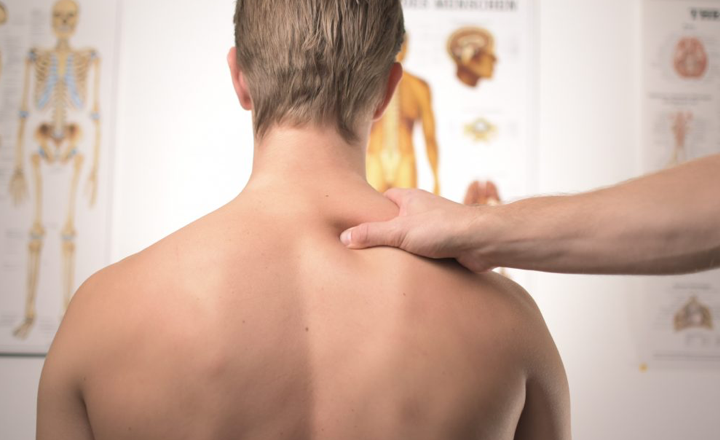 Client receiving deep tissue massage